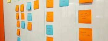 Planning board with sticky notes arranged in columns